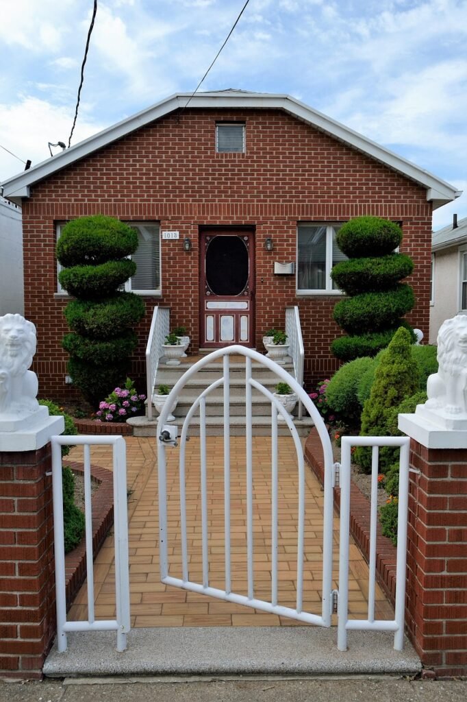 house, home, residence, flower background, residential, estate, real, architecture, family, new, brick house, brick home, property, brick, housing, lawn, walkway, contemporary, small house, mini house, flower wallpaper, mini, entrance, open gate, welcome, white gate, lions, gatekeepers, trees, mowed, green, trimmed, crafty, gardening, groomed, landscaping, yard, landscape, grass, outdoor, fresh, design, mow, color, gardener, hedge, neat, well groomed, well kept, cared for, care, clean, nice, painted, white, bricks, steel, telephone wire, queens new york, nyc, botany, flora, flower, colorful, spring, summer, plant, nature, garden, botanical, blossom, blooming, exterior, bloom, front yard, steps, iron, cast iron gate, front door, insurance, beautiful flowers, claim, deed, mortgage, rent, owner, ownership, investment, decoration, natural, leaf, window, front, pink, lavender, tree, hedges, floor, ground, sidewalk, opened, glass, urban